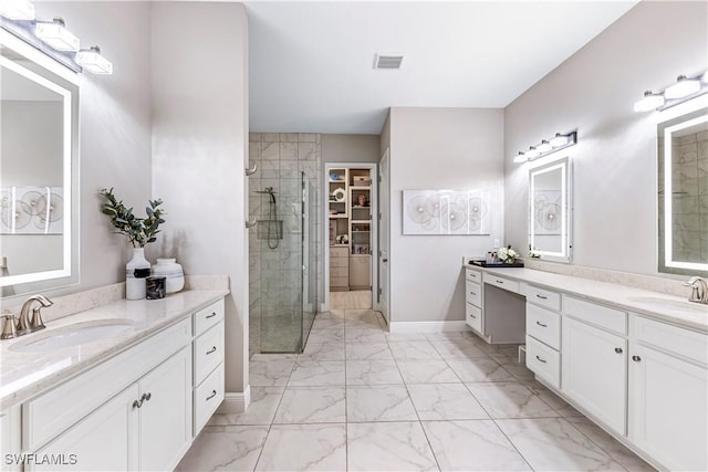 3829 Helmsman Dr, Naples, FL 34120 - bathroom featuring marble finish floors, a shower stall, two vanities, and a spacious closet