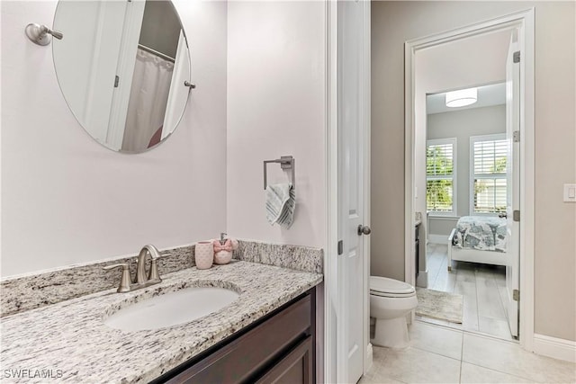 3829 Helmsman Dr, Naples, FL 34120 - full bath featuring tile patterned floors, vanity, and ensuite bathroom