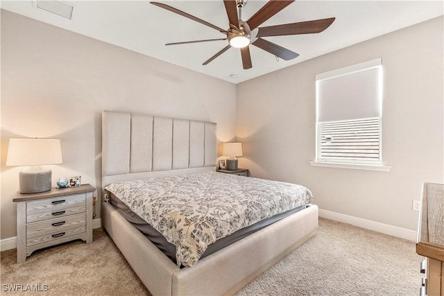 3829 Helmsman Dr, Naples, FL 34120 - bedroom featuring light carpet and ceiling fan