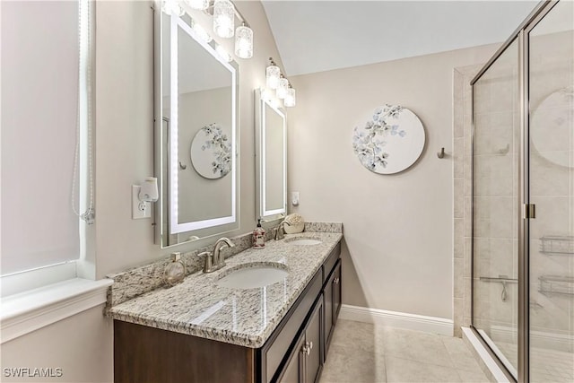 3829 Helmsman Dr, Naples, FL 34120 - bathroom with double vanity, a stall shower, and tile patterned floors