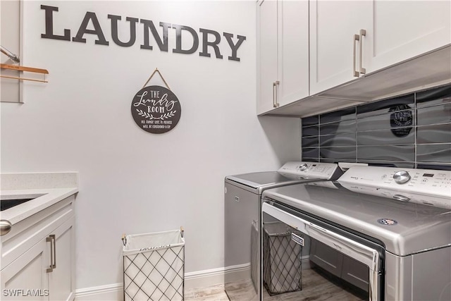 3829 Helmsman Dr, Naples, FL 34120 - laundry area featuring washer and dryer and cabinet space