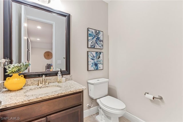 3829 Helmsman Dr, Naples, FL 34120 - half bath with vanity and tile patterned flooring