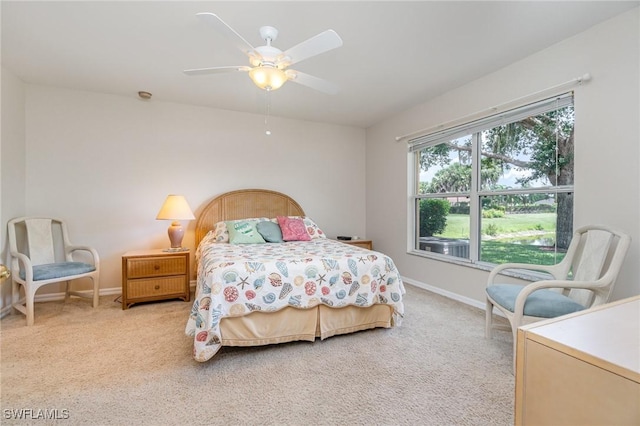 9322 Aegean Cir, Lehigh Acres, FL 33936 - bedroom with carpet and a ceiling fan