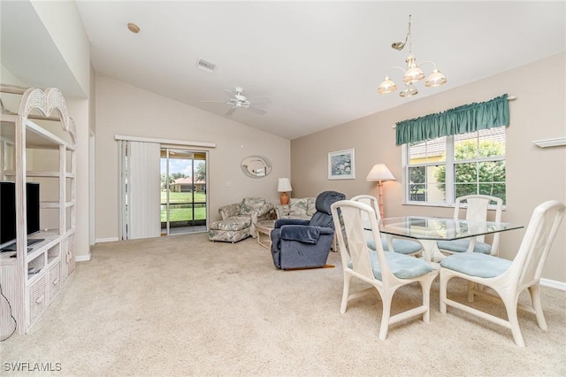 9322 Aegean Cir, Lehigh Acres, FL 33936 - carpeted dining area with a ceiling fan, lofted ceiling, and a chandelier