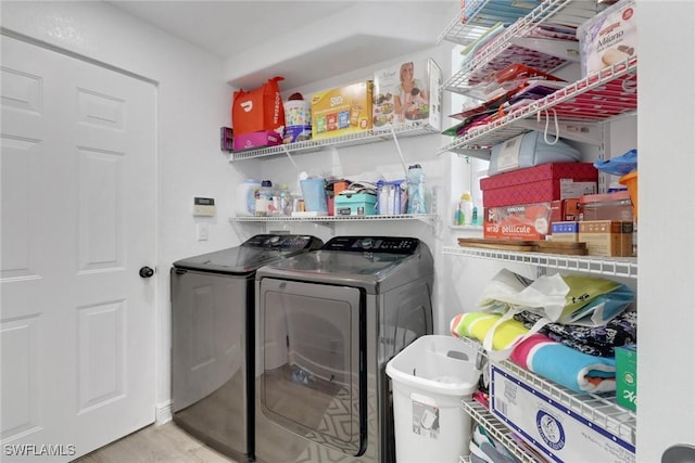 8644 Ibis Cove Cir, Naples, FL 34119 - laundry area with washing machine and dryer