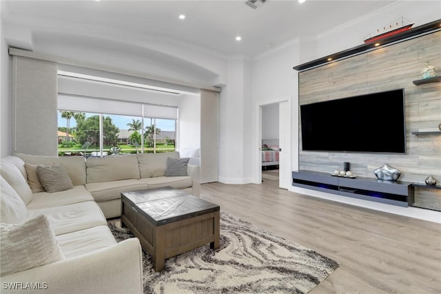 8644 Ibis Cove Cir, Naples, FL 34119 - living area with ornamental molding, wood finished floors, and recessed lighting