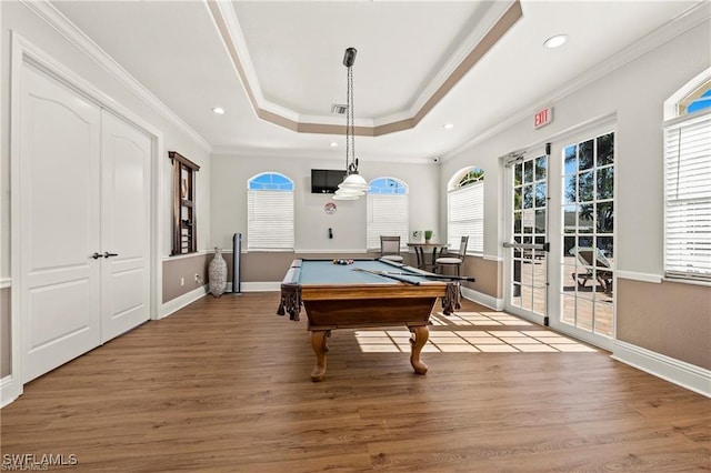 8644 Ibis Cove Cir, Naples, FL 34119 - game room with a raised ceiling, pool table, ornamental molding, light wood-type flooring, and recessed lighting