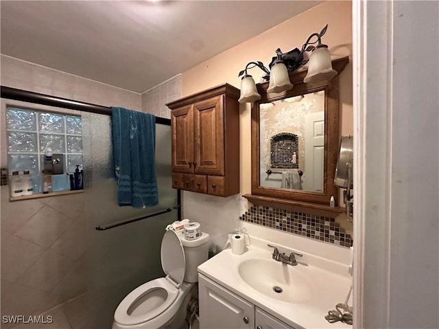 16940 Tarpon Way N, Fort Myers, FL 33917 - bathroom featuring vanity, a shower, and decorative backsplash