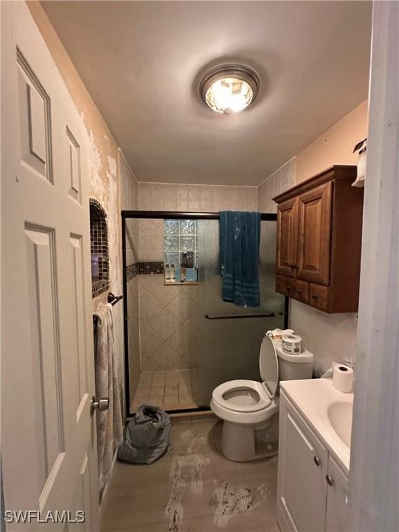 16940 Tarpon Way N, Fort Myers, FL 33917 - bathroom featuring vanity and a stall shower