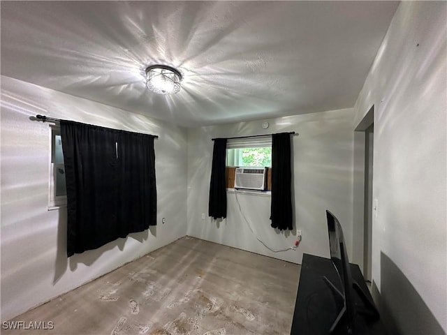 16940 Tarpon Way N, Fort Myers, FL 33917 - spare room with concrete flooring and cooling unit