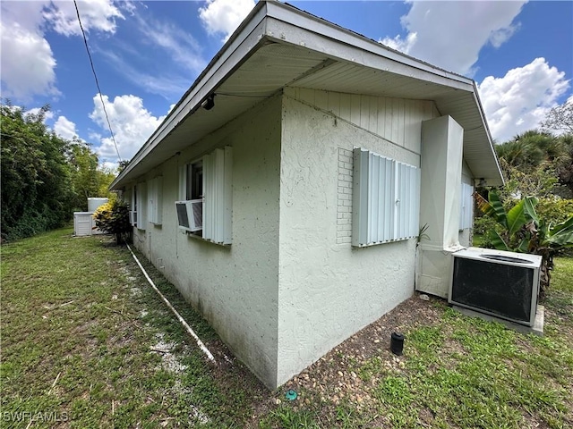 16940 Tarpon Way N, Fort Myers, FL 33917 - view of property exterior with stucco siding