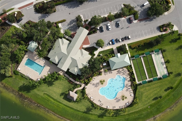 2245 Pigeon Plum Way N, Fort Myers, FL 33917 - aerial view of property and surrounding area featuring a pool area and a nearby body of water
