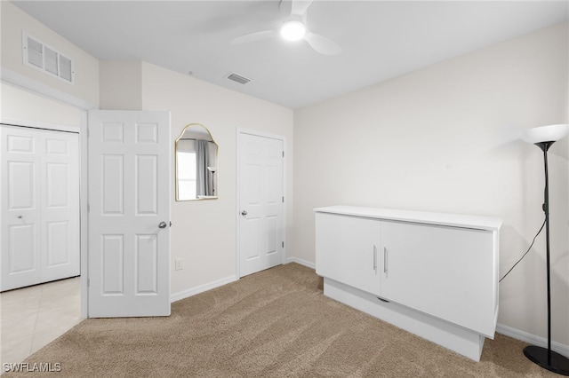 2245 Pigeon Plum Way N, Fort Myers, FL 33917 - unfurnished bedroom with light colored carpet and ceiling fan
