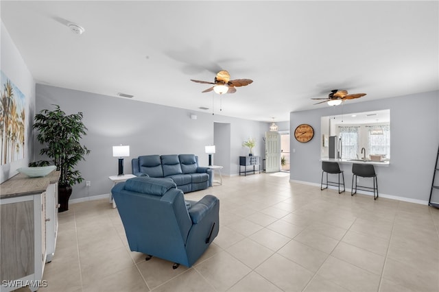 2245 Pigeon Plum Way N, Fort Myers, FL 33917 - living room featuring ceiling fan and light tile patterned floors