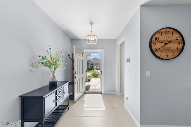 2245 Pigeon Plum Way N, Fort Myers, FL 33917 - entryway with a chandelier and light tile patterned floors