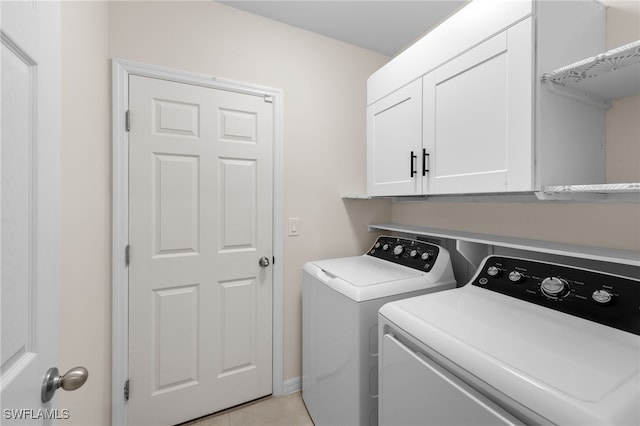 2245 Pigeon Plum Way N, Fort Myers, FL 33917 - washroom featuring independent washer and dryer, cabinet space, and light tile patterned floors