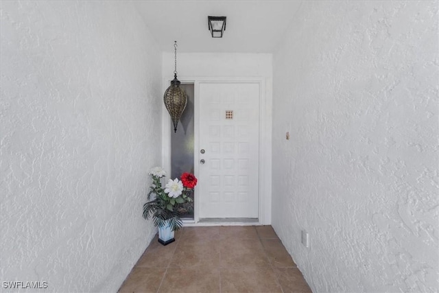 20013 Petrucka Cir N, Lehigh Acres, FL 33936 - view of exterior entry featuring stucco siding
