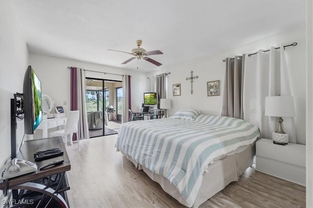 20013 Petrucka Cir N, Lehigh Acres, FL 33936 - bedroom featuring access to outside, light wood-style flooring, and ceiling fan