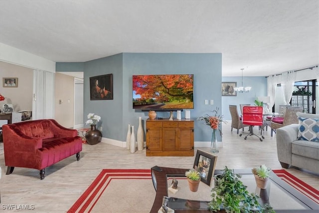 20013 Petrucka Cir N, Lehigh Acres, FL 33936 - living area featuring a chandelier and wood finished floors