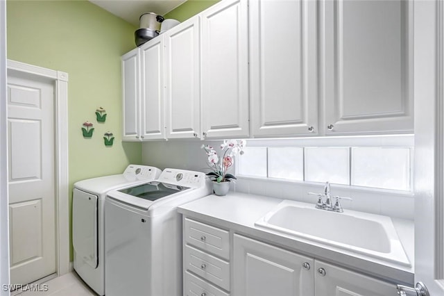 2799 Jude Island Way, Naples, FL 34119 - washroom with cabinet space and washer and dryer