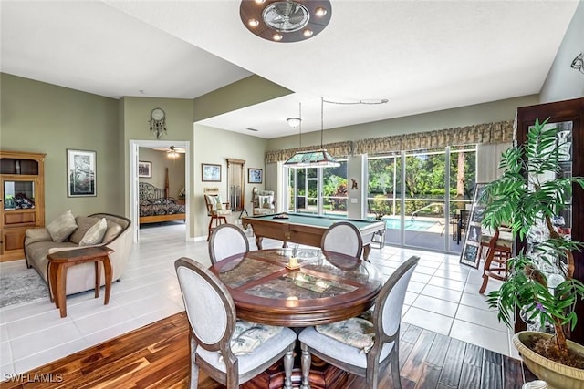 2799 Jude Island Way, Naples, FL 34119 - tiled dining space with billiards and baseboards