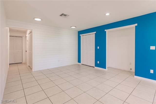 217 Yorkshire Ct Unit 2, Naples, FL 34112 - spare room with recessed lighting and light tile patterned floors