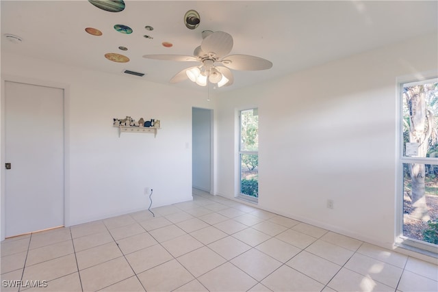 217 Yorkshire Ct Unit 2, Naples, FL 34112 - unfurnished room with ceiling fan and light tile patterned floors