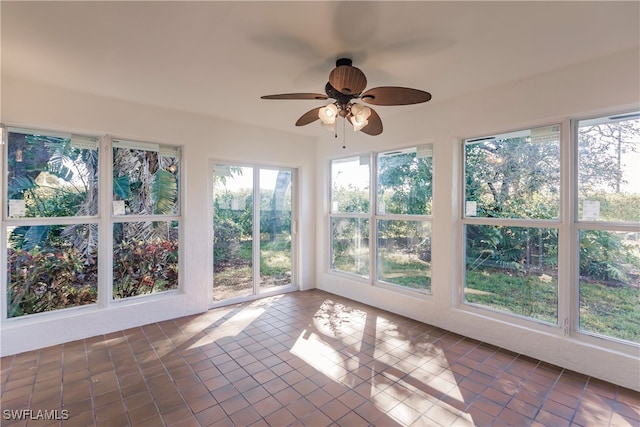 217 Yorkshire Ct Unit 2, Naples, FL 34112 - unfurnished sunroom with tile patterned flooring