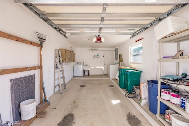 217 Yorkshire Ct Unit 2, Naples, FL 34112 - garage with a garage door opener and independent washer and dryer