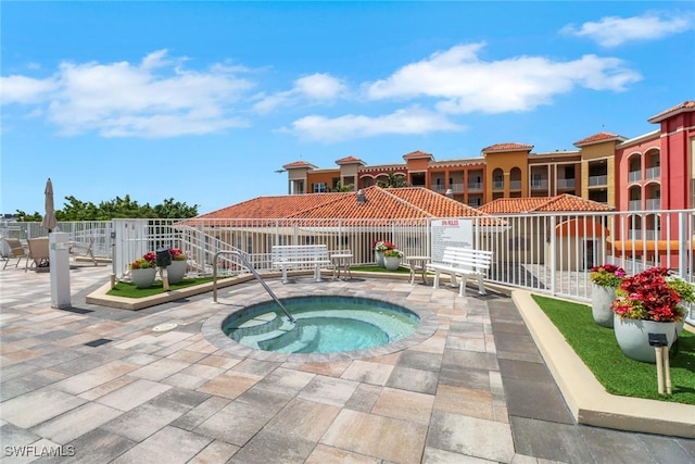 401 Bayfront Pl Unit 3502, Naples, FL 34102 - view of pool featuring a hot tub and a patio area