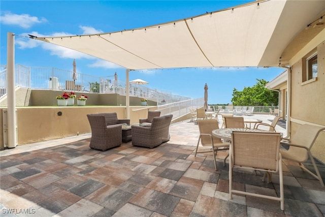 401 Bayfront Pl Unit 3502, Naples, FL 34102 - view of patio with outdoor dining area