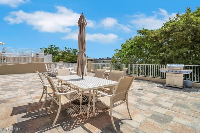 401 Bayfront Pl Unit 3502, Naples, FL 34102 - view of patio / terrace with area for grilling and outdoor dining space