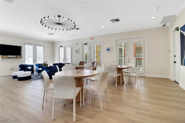 401 Bayfront Pl Unit 3502, Naples, FL 34102 - dining area featuring french doors, crown molding, light wood-type flooring, and recessed lighting