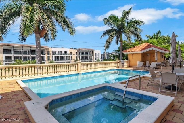 401 Bayfront Pl Unit 3502, Naples, FL 34102 - community pool featuring a community hot tub and a patio area