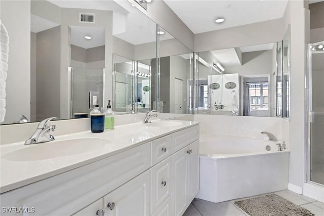 401 Bayfront Pl Unit 3502, Naples, FL 34102 - full bath with a garden tub, double vanity, a stall shower, and tile patterned flooring