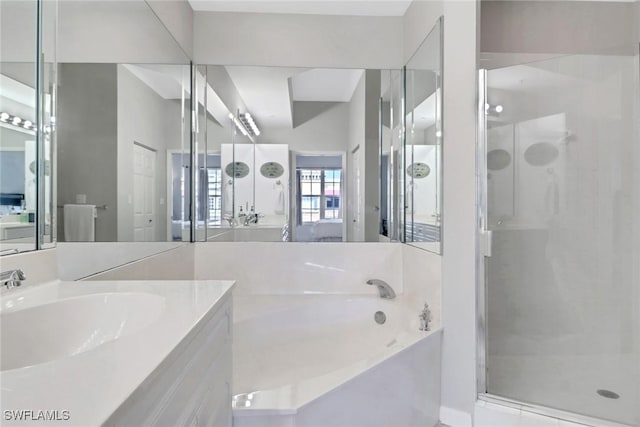 401 Bayfront Pl Unit 3502, Naples, FL 34102 - bathroom with a stall shower, a garden tub, and vanity