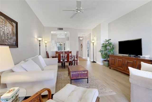 401 Bayfront Pl Unit 3502, Naples, FL 34102 - living room featuring light wood-style floors and a ceiling fan