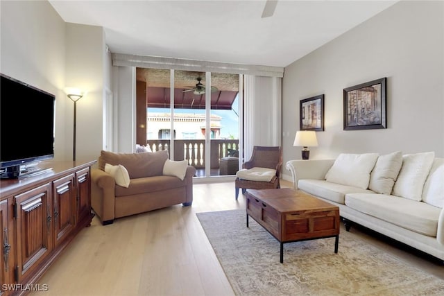 401 Bayfront Pl Unit 3502, Naples, FL 34102 - living area with a ceiling fan and light wood finished floors