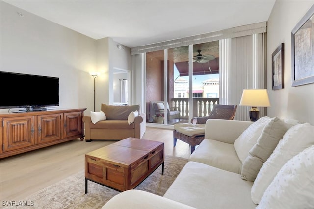 401 Bayfront Pl Unit 3502, Naples, FL 34102 - living area with light wood-style flooring and a ceiling fan