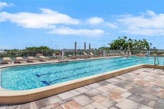 401 Bayfront Pl Unit 3502, Naples, FL 34102 - community pool with a patio area