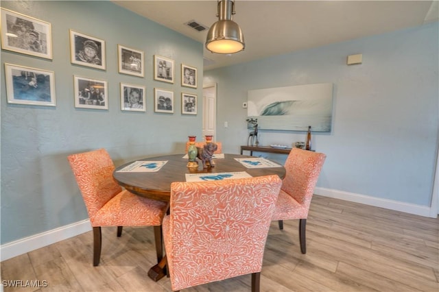 6008 Cypress Ln, Bonita Springs, FL 34134 - dining space with light wood-style floors