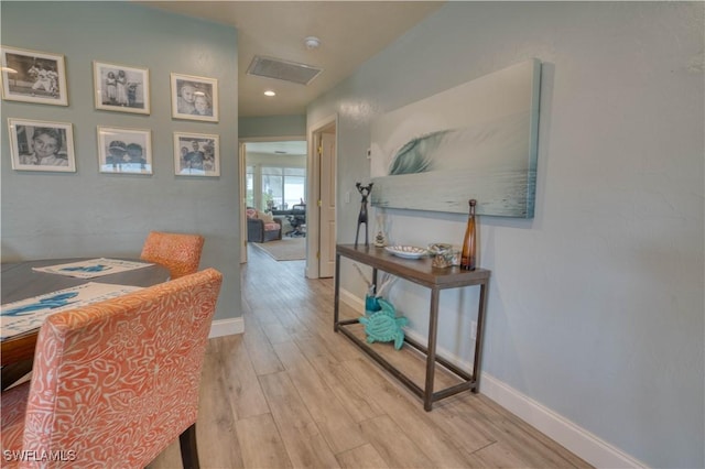 6008 Cypress Ln, Bonita Springs, FL 34134 - corridor featuring light wood-type flooring and recessed lighting