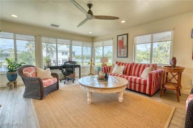 6008 Cypress Ln, Bonita Springs, FL 34134 - living room featuring healthy amount of natural light, wood finished floors, a ceiling fan, recessed lighting, and an office area