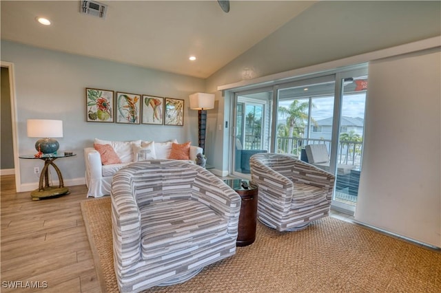 6008 Cypress Ln, Bonita Springs, FL 34134 - living area with vaulted ceiling, recessed lighting, and wood finished floors