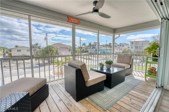 6008 Cypress Ln, Bonita Springs, FL 34134 - sunroom featuring a ceiling fan, a residential view, and plenty of natural light