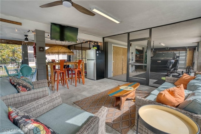6008 Cypress Ln, Bonita Springs, FL 34134 - living area with a ceiling fan