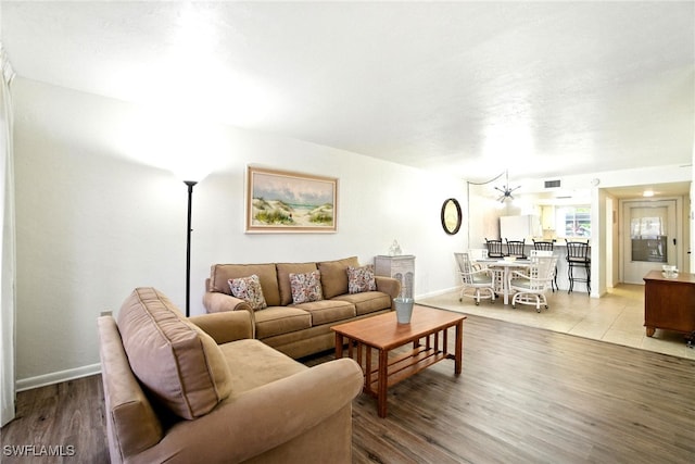 2079 Barkeley Ln Unit 6, Fort Myers, FL 33907 - living area with wood finished floors