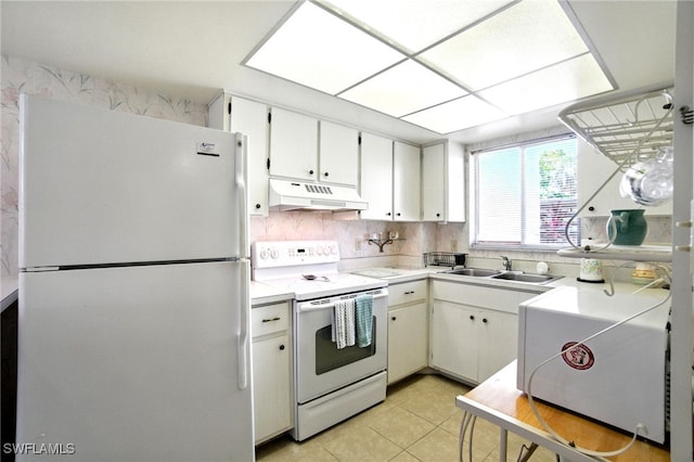 2079 Barkeley Ln Unit 6, Fort Myers, FL 33907 - kitchen featuring white appliances, under cabinet range hood, light tile patterned floors, light countertops, and tasteful backsplash