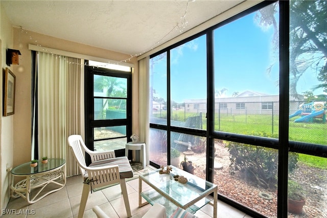 2079 Barkeley Ln Unit 6, Fort Myers, FL 33907 - sunroom / solarium featuring tile patterned flooring