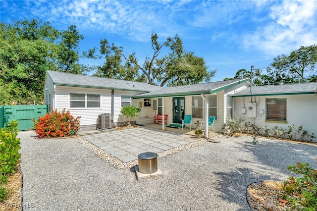 1308 Hull St S, Gulfport, FL 33707 - back of property with a patio and a gate
